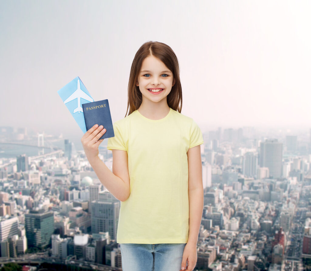 A family reviewing school brochures in the UK, representing education options for children of Skilled Worker visa holders.
