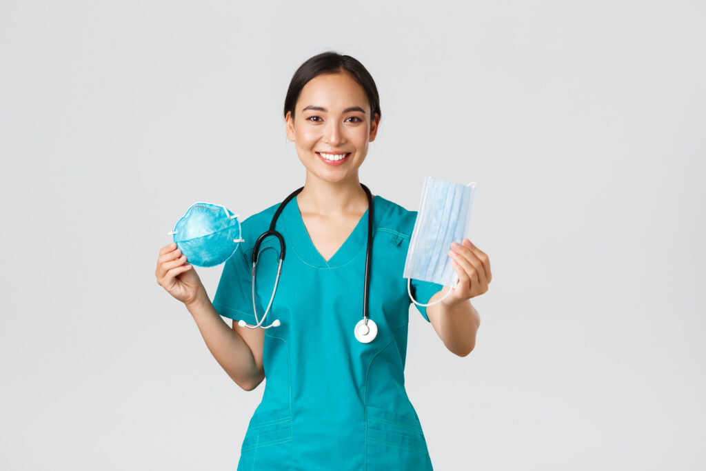 Person reviewing UK visa documents on a desk, symbolising the process of switching from a Health and Care Worker visa to a Skilled Worker visa.
